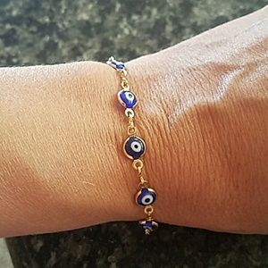 Gold plated evil eye Bracelet size 7.5 inches